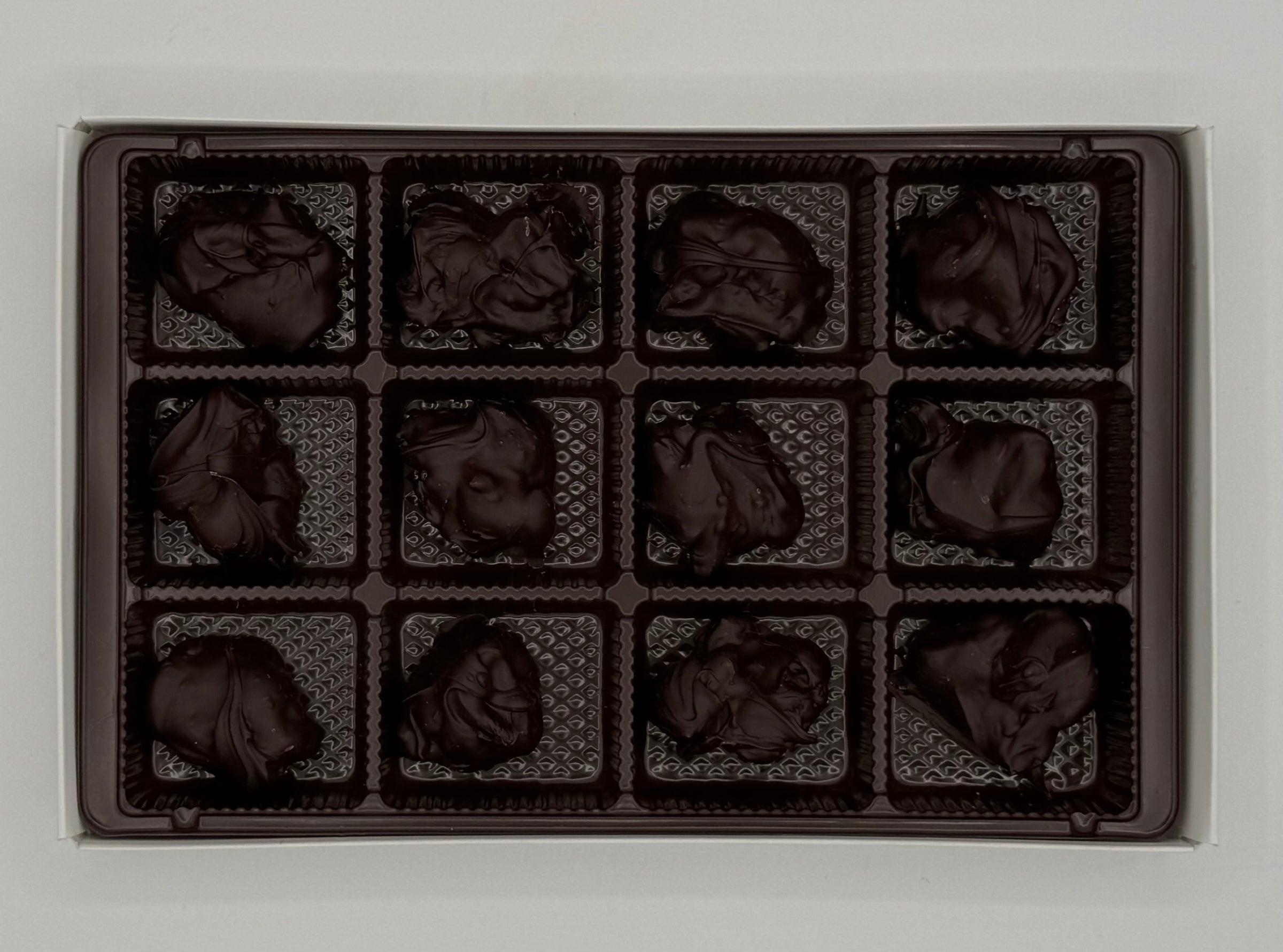 Deluxe Milk Chocolates | Clark Candies, Inc.